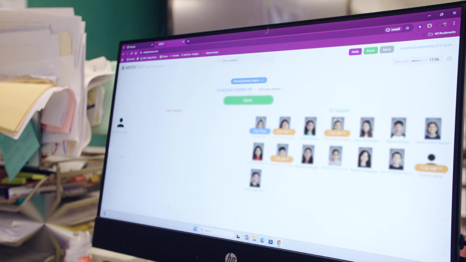 Teacher screen showing student photos, present and absent side by side